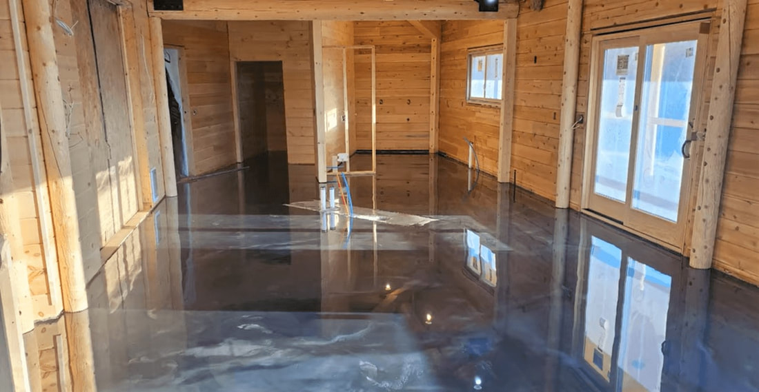 Finished basement floor after reflector enhancer Epoxy was applied