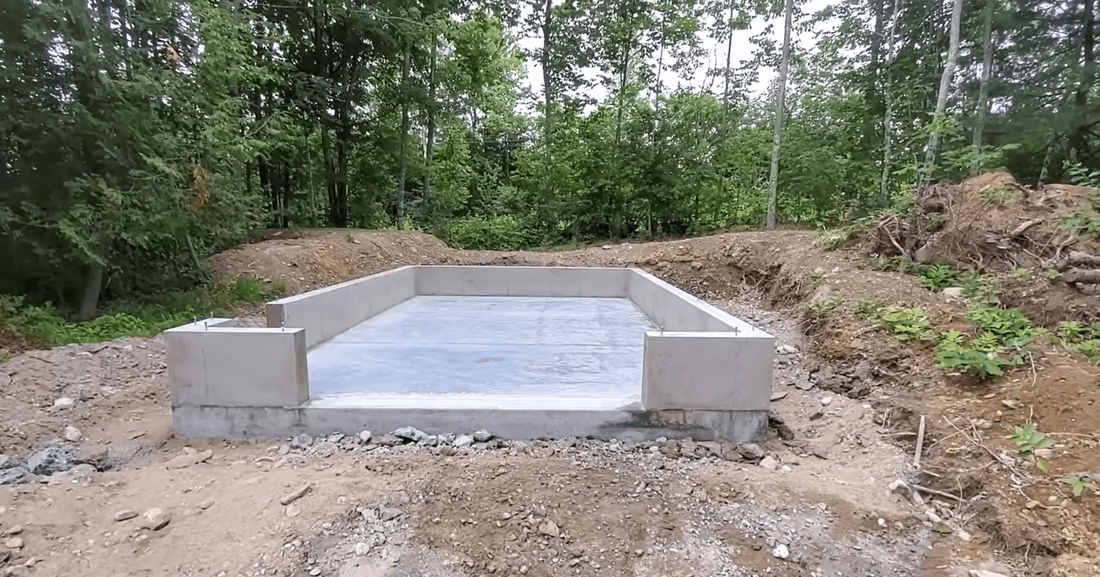 Concrete slab with knee wall for detached garage